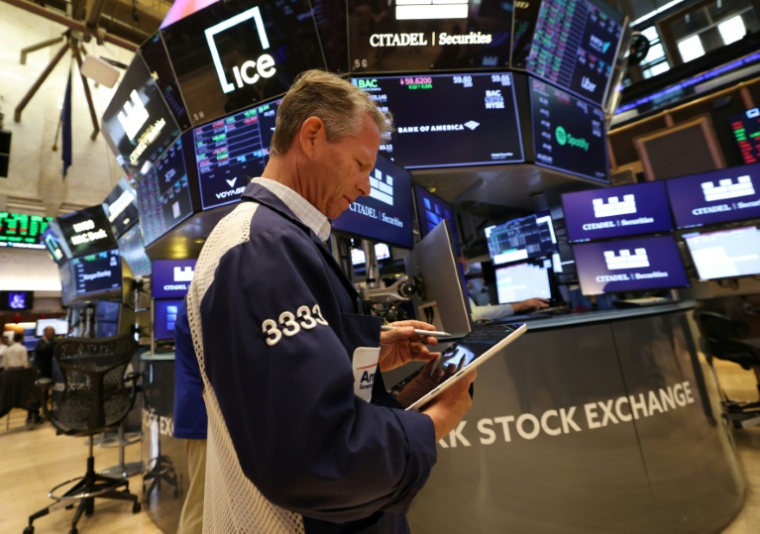 Un opérateur à la Bourse de New York, le 14 juillet 2026 ( AFP / TIMOTHY A. CLARY )