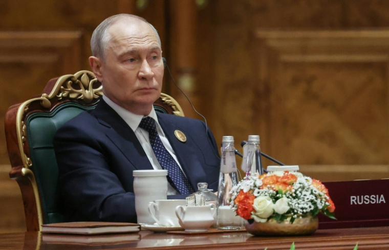 Photo diffusée par l'agence d'Etat russe Sputnik montrant le président russe Vladimir Poutine lors du 18e sommet des BRICS, le 12 septembre 2026 à New Delhi ( POOL / Alexander KAZAKOV )