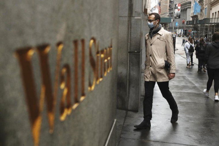 WALL STREET OUVRE EN HAUSSE