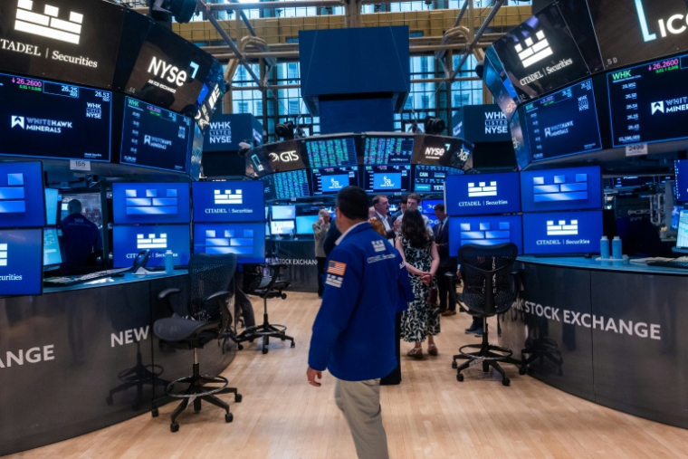 Traders sur le parquet du New York Stock Exchange (NYSE) le 11 juin 2026 à New York. ( GETTY IMAGES NORTH AMERICA / SPENCER PLATT )