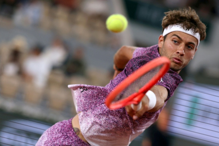L'Italien Flavio Cobolli lors de sa victoire face au Canadien Félix Auger-Aliassime en quart de finale de Roland-Garros le 3 juin 2026 ( AFP / Alain JOCARD )