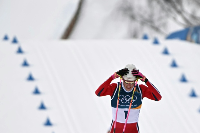 Le fondeur norvégien Johannes Klaebo, vainqueur du 50 km, sa sixième médaille d'or en six courses, aux JO de Milan Cortina, le 21 février 2026 à Lago di Tesero ( AFP / Javier SORIANO )