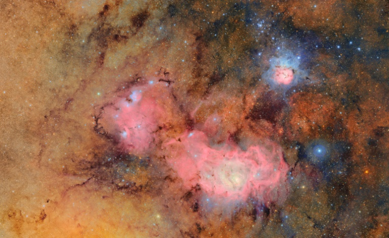 Image non-datée prise par l'observatoire Vera Rubin publiée le 20 juin par le NSF et le DOE de la nébuleuse trifide et de la lagune ( NSF-DOE Vera C. Rubin Observatory / HANDOUT )