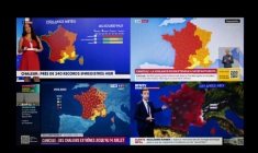Des chaînes d'information françaises affichant une carte de la France, au plus fort de la vague de chaleur. La canicule qui touche la France métropolitaine depuis le 17 juin a fait grimper les températures à 40 °C ou plus dans plus de 50 départements, principalement dans l’ouest et le sud du pays, selon une analyse de l’AFP basée sur les données de Météo-France. ( AFP / JOEL SAGET )