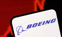 Le logo de Boeing et un graphique boursier en hausse