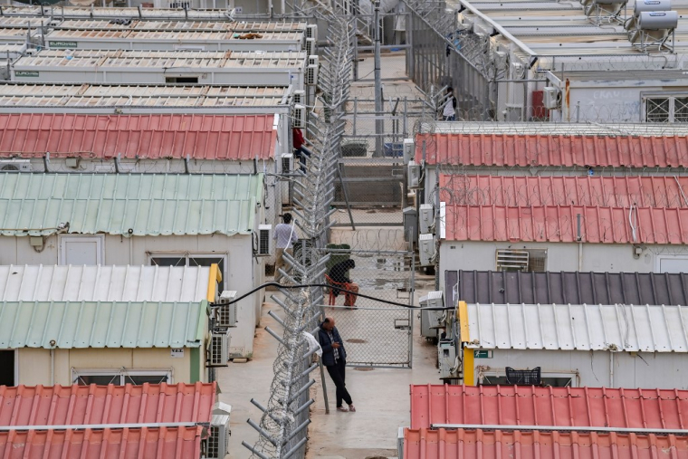 Un camp de migrants en Grèce. (illustration) ( AFP / ARIS MESSINIS )