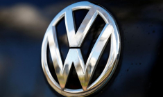 A logo of Volkswagen is seen inside a car dealer in Nijmegen