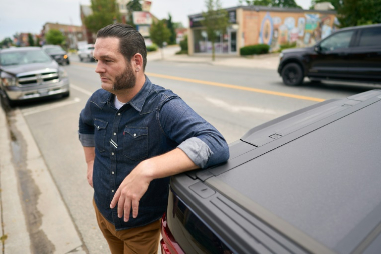 Brett Hueston, éditeur du journal Aylmer Express, le 9 juillet 2025 à Aylmer, au Canada ( AFP / Geoff Robins )