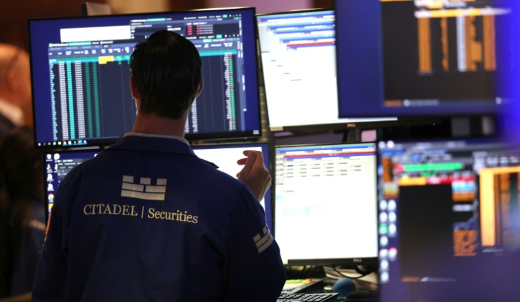 Un opérateur à la Bourse de New York, le 16 mars 2026 ( AFP / TIMOTHY A. CLARY )