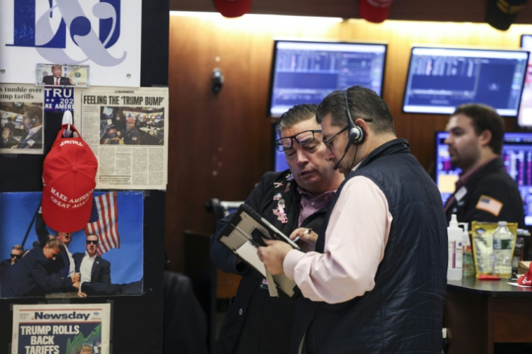 Des opérateurs à la Bourse de New York le 21 novembre 2025 ( AFP / ANGELA WEISS )