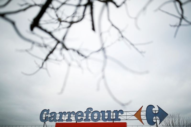 ELISABETH BORNE "OPPOSÉE" À UN RACHAT DE CARREFOUR PAR COUCHE-TARD