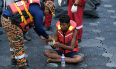 Iman Shorif (D) à Langkawi, en Malaisie, le 11 November 2025 ( AFP / Hakim Mustapha )