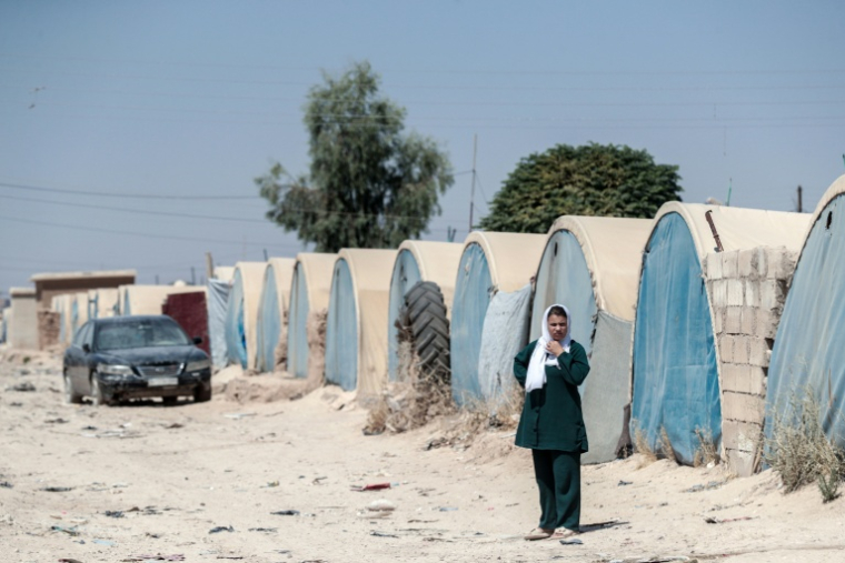 Une femme kurde syrienne déplacée, originaire de la ville de Ras al-Aïn, dans le camp de déplacés d'al-Talaeh, à Hassaké, dans le nord-est de la Syrie, le 23 juillet 2026 ( AFP / Delil SOULEIMAN )