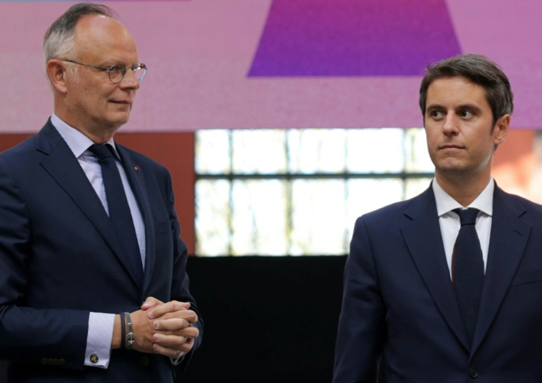 Gabriel Attal (D) et Édouard Philippe, le 6 avril 2025 à Saint-Denis ( AFP / Thomas SAMSON )