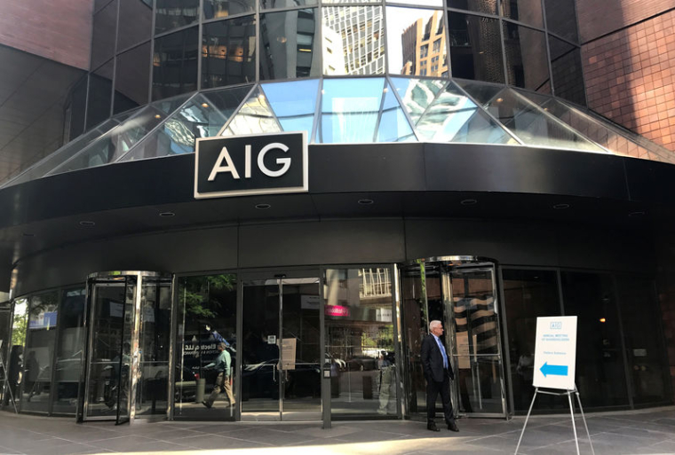 AIG: CATASTROPHES ET VOLATILITÉ ONT PLOMBÉ LE RÉSULTAT
