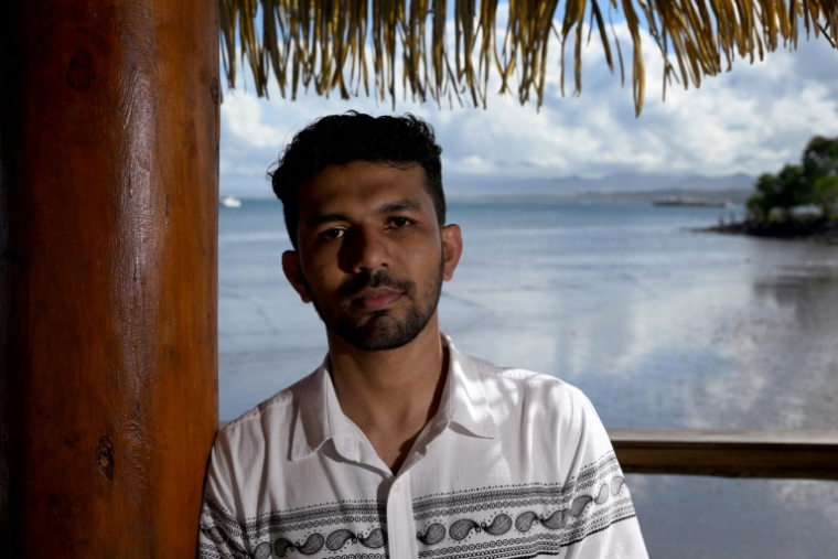 L'étudiant fidjien Vishal Prasad, militant pour le climat, lors du Forum des îles du Pacifique (PIF) à Suva, le 12 juillet 2022 ( AFP / William WEST )