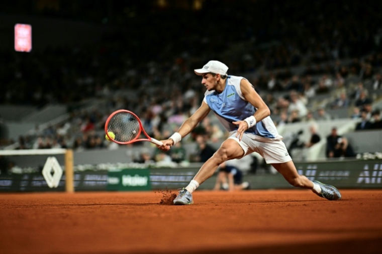 L'Italien Matteo Arnaldi en quart de finale de Roland-Garros contre son compatriote Matteo Berrettini le 3 juin 2026 à Paris ( AFP / JULIEN DE ROSA )
