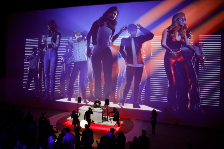 Des visiteurs à l'exposition "Clubbing" au Grand palais immersif à Paris, le 12 mai 2025 ( AFP / Ludovic MARIN )