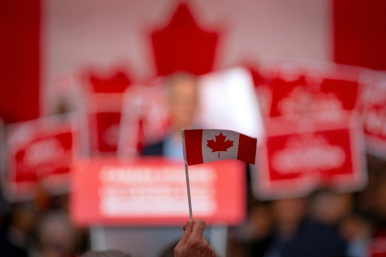 Lors d'un meeting du candidat libéral Mark Carney le 4 avril 2025, à Toronto ( AFP / Peter POWER )