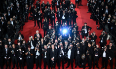 Des photographes en action après la projection du film "Eddington" lors de la 78ème édition du Festival de Cannes, dans le sud de la France, le 16 mai 2025 ( AFP / Antonin THUILLIER )