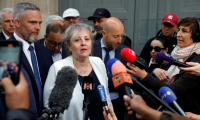 Emmanuelle Cordier, présidente de la Fédération nationale des taxis (FNDT), répond aux questions des journalistes après une réunion avec le Premier ministre François Bayrou, à Paris le 24 mai 2025 ( AFP / GEOFFROY VAN DER HASSELT )