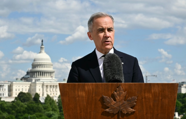 Le Premier ministre canadien Mark Carney lors d'une conférence de presse à Washington, le 6 mais 2025 ( AFP / Mandel NGAN )