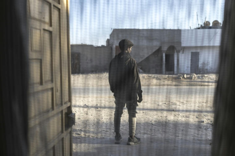 Un migrant pose à Nouadhibou, en Mauritanie, le 22 avril 2026 ( AFP / PATRICK MEINHARDT )
