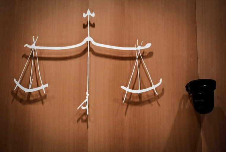 Après les interpellations dans le cadre d'enquêtes sur l'acquisition de poupées sexuelles à caractère pédopornographique, deux suspects seront jugés en 2026 ( AFP / STEPHANE DE SAKUTIN )