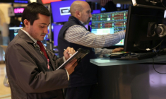 Des opérateurs à la Bourse de New York le 14 janvier 2026 ( AFP / TIMOTHY A. CLARY )
