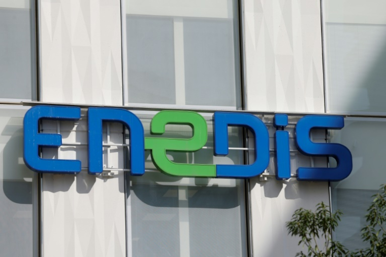 Le gestionnaire du réseau de distribution d'électricité Enedis met en garde ses clients contre une recrudescence de "démarchages frauduleux" par de "faux agents" d'Enedis ( AFP / Ludovic MARIN )