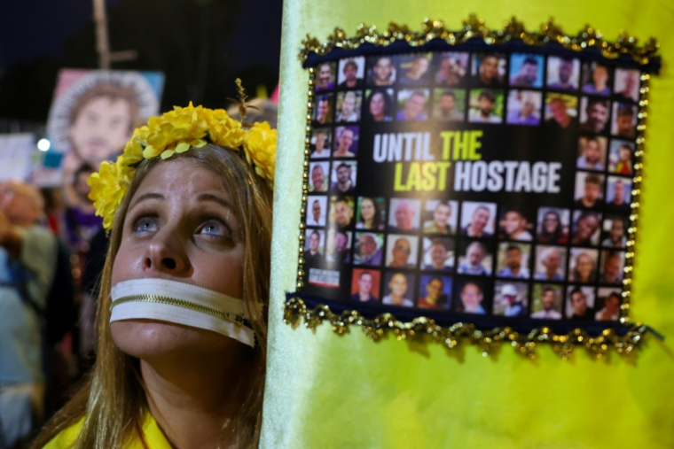 Manifestation devant le ministère israélien de la Défense à Tel-Aviv pour réclamer le retour des otages dans la bande de Gaza, le 31 mai 2025 ( AFP / Jack GUEZ )
