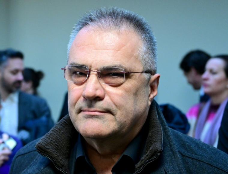 L'ancien agent autrichien Egisto Ott à son arrivée à la cour criminelle de Vienne le 22 janvier 2026 ( APA / ROLAND SCHLAGER )