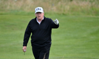 Le président américain Donald Trump joue au glof à Turnberry en Ecosse, le 26 juillet 2025 ( AFP / ANDY BUCHANAN )