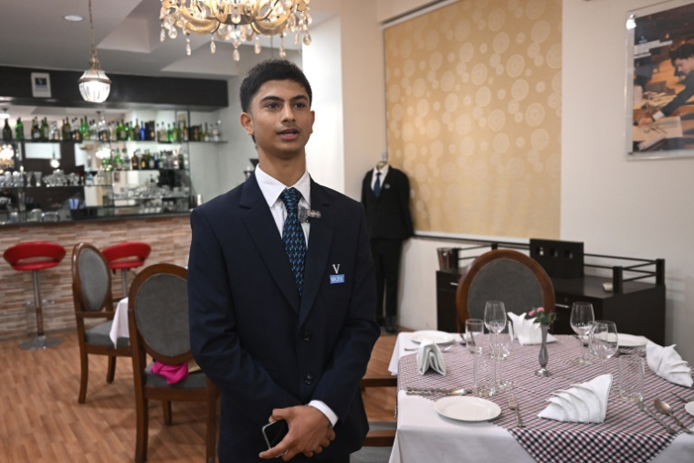 L'étudiant indien Amitabh Sukhwal à l'école de gestion hôtelière et touristique Vatel de Gurugram, en Inde, le 22 septembre 2026 ( AFP / Arun SANKAR )