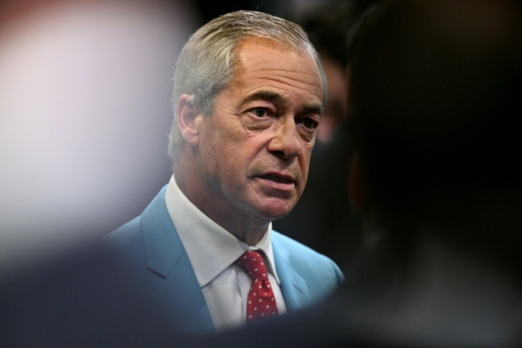 Nigel Farage, chef du parti Reform UK, assiste à la troisième journée du congrès annuel du parti à Birmingham, dans le centre de l'Angleterre, le 5 septembre 2026 ( AFP / Oli SCARFF )