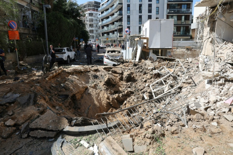 Dégâts à Tel-Aviv, en Israël, après une attaque iranienne, le 24 mars 2026 ( AFP / Jack GUEZ )