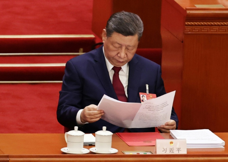 Le président chinois Xi Jinping (c) lors de la séance de clôture de l'Assemblée nationale populaire (ANP) au Palais de l'Assemblée du Peuple à Pékin, le 12 mars 2026 ( POOL / Andres MARTINEZ CASARES )