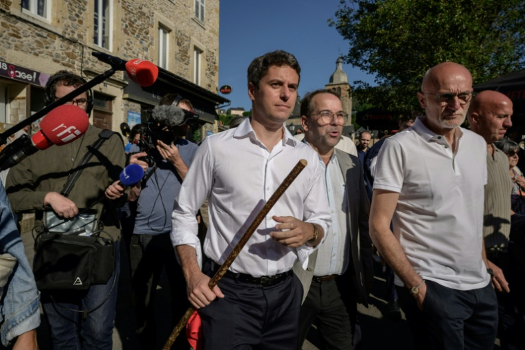 L'ancien Premier ministre et secrétaire général du parti Renaissance Gabriel Attal  participe à une fête de la transhumance Saint-Geniez-d'Olt, dans l'Aveyron, le 23 mai 2026 ( AFP / Ed JONES )