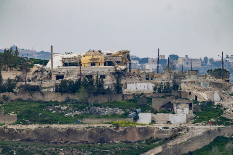Des bâtiments détruits dans le village de Yaroun, au Liban, le 13 mars 2026 ( AFP / Odd ANDERSEN )