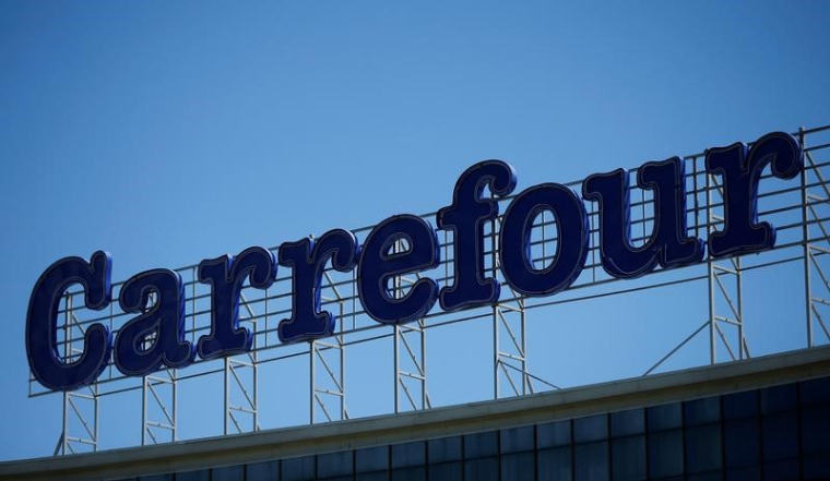 CARREFOUR GRIMPE SUR DES RUMEURS DE RACHAT PAR AMAZON