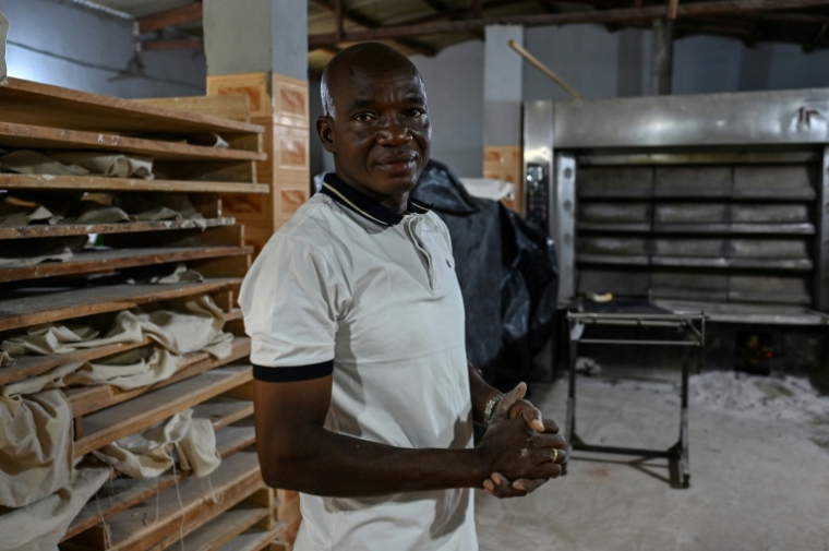 Traoré Lacina, président des commerçants de Doropo, à la frontière avec le Burkina Faso, le 12 octobre 2025 dans le nord-est de la Côte d'Ivoire ( AFP / Issouf SANOGO )