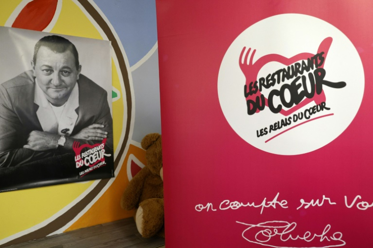 Les Restos du coeur lancent mardi leur traditionnelle campagne de distribution alimentaire ( AFP / Geoffroy VAN DER HASSELT )