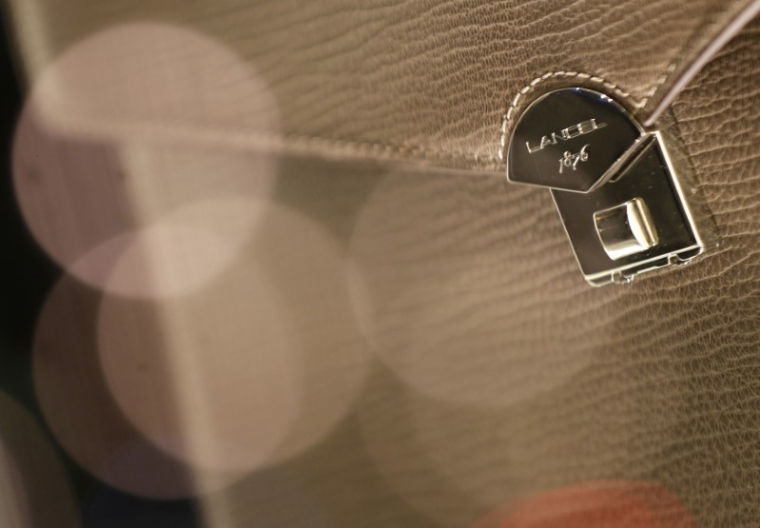 RICHEMONT EST ATTACHÉ À SES MARQUES DUNHILL ET LANCEL