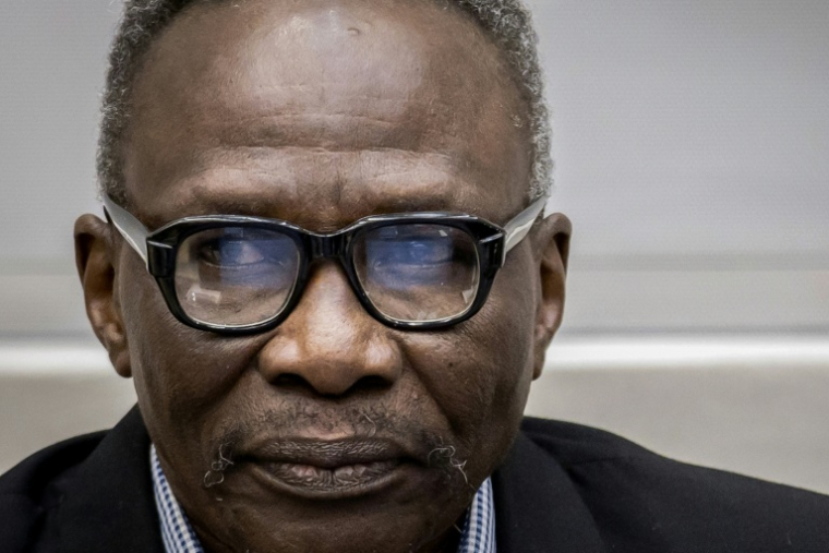 L'ancien chef de milice janjawid au Soudan Ali Mohamed Ali Abd-Al-Rahman, connu sous le nom de guerre d'Ali Kosheib, apparait lors d'une audience de la CPI à la Haye, le 19 octobre 2023.  ( ANP / Koen van Weel )