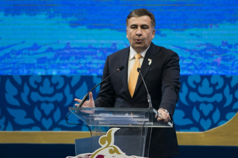 Mikheïl Saakachvili, alors président de la Géorgie, prononce un discours à Chiang Mai, en Thaïlande, le 20 mai 2013 ( AFP / Nicolas ASFOURI )