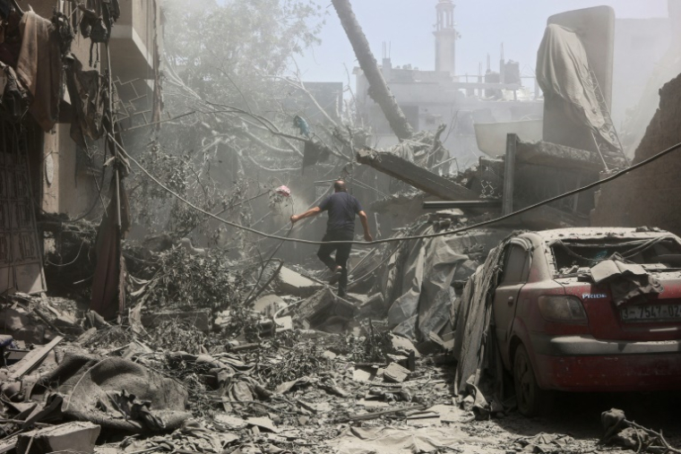 Après un bombardement israélien sur la ville de Gaza, le 31 mai 2025 ( AFP / Omar AL-QATTAA )