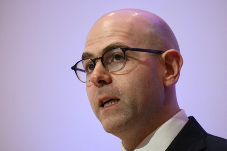 L'économiste américain et membre du Conseil des gouverneurs de la Réserve fédérale américaine (Fed), Stephen Miran, donne une conférence à Athènes, le 14 janvier 2025 ( AFP / Angelos TZORTZINIS )