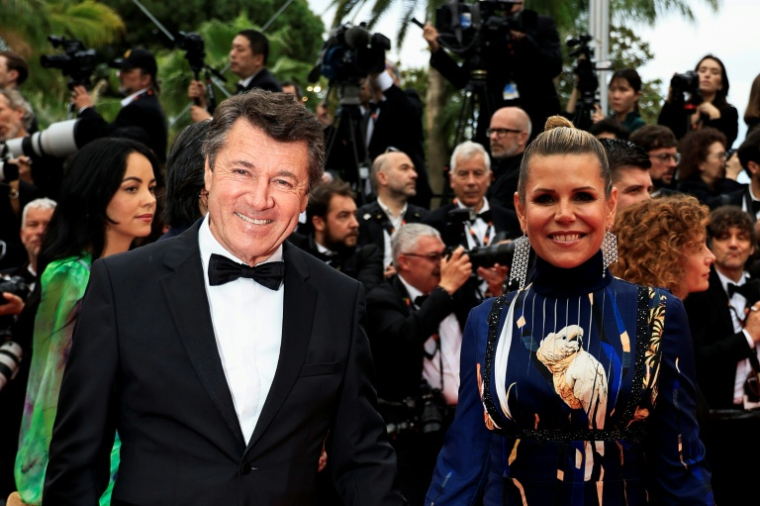 Christian Estrosi et Laura Tenoudji au Festival de Cannes, le 20 mai 2023 ( AFP / Valery HACHE )
