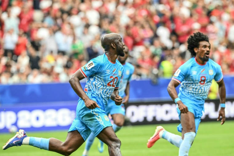 L'attaquant congolais Yoane Wissa (C) après avoir inscrit le but égalisateur contre le Portugal, au Mondial-2026, le 17 juin 2026 à Houston (Etats-Unis) ( AFP / RONALDO SCHEMIDT )