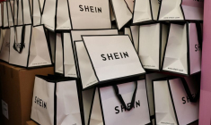 FILE PHOTO: A company logo for fashion brand Shein is seen on a pile of gift bags on its Christmas bus as part of a nationwide promotional tour in Liverpool, Britain